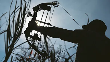 Person using a crossbow